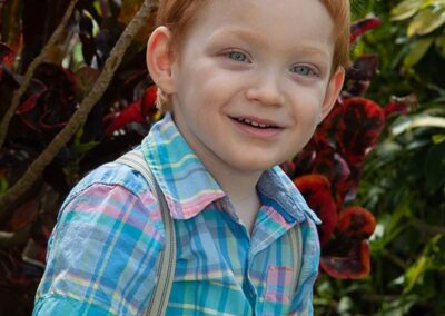 kian in front of greenery