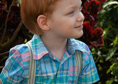 kian in front of greenery